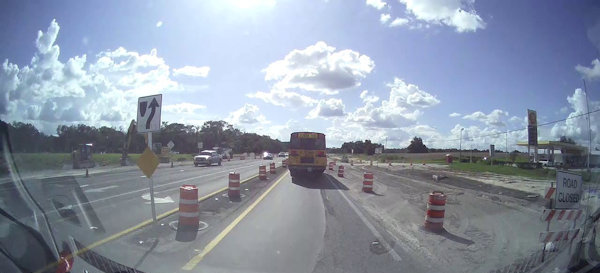 Image taken from an on-vehicle camera showing construction objects.