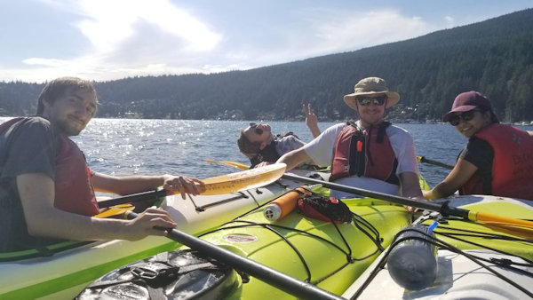 Vizzion's team enjoys some time on the water after work